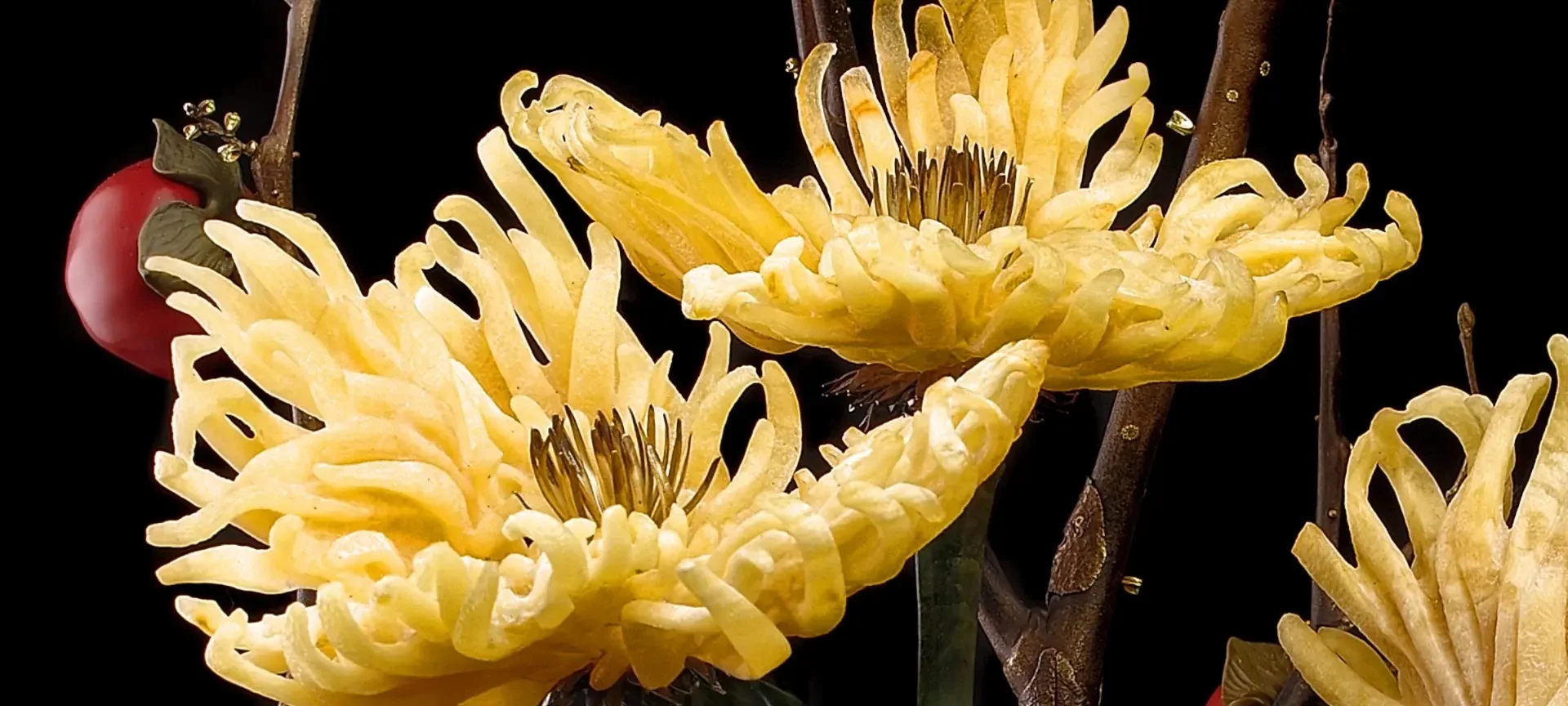 A close view of layered yellow petals and delicate floral centers.
